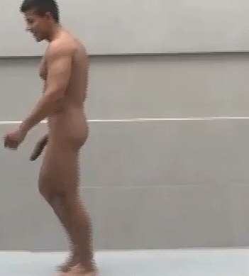 Man of color walking naked.gif